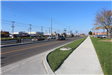 New lanes, sidewalk, curbs, ramps, and landscaping on Sagamore Parkway